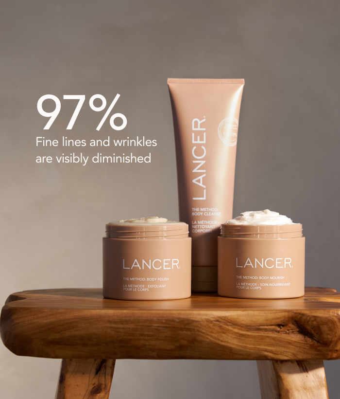 Lancer skincare products on a wooden stool with a neutral background-Lancer Skincare
