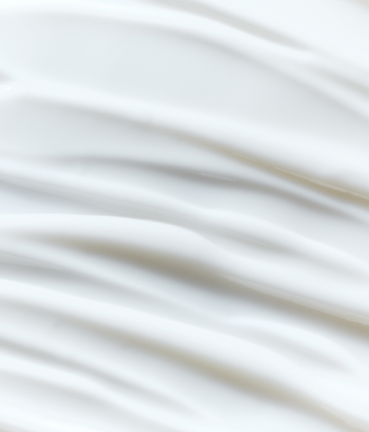 Silver skincare serum bottle with 'Lancer' branding on a white background