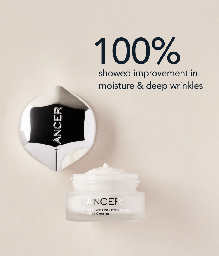 Lancer skincare product with cream and applicator on a beige background-Lancer Skincare