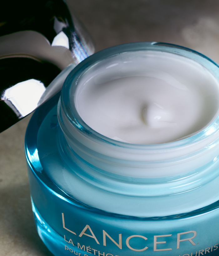 Jar of Lancer skincare product with cream visible-Lancer Skincare