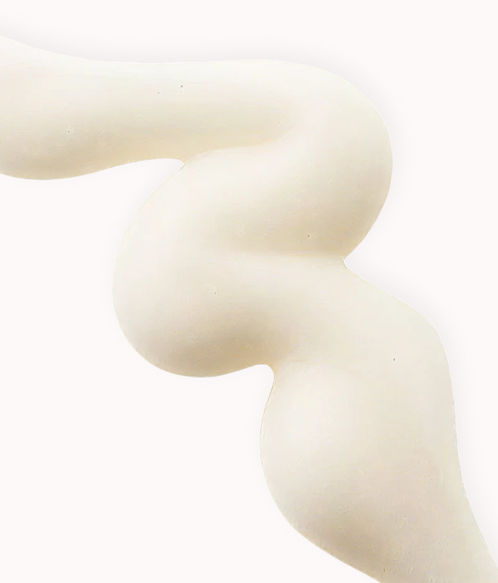 Close-up of a white, creamy serum