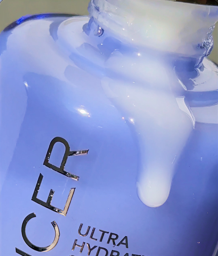 Close-up of a purple serum bottle